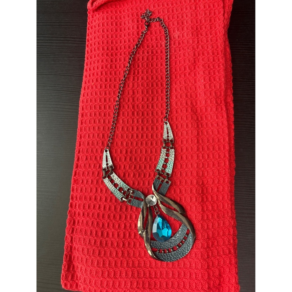 unbranded articulated hammered blue metal teardrop necklace and earring set